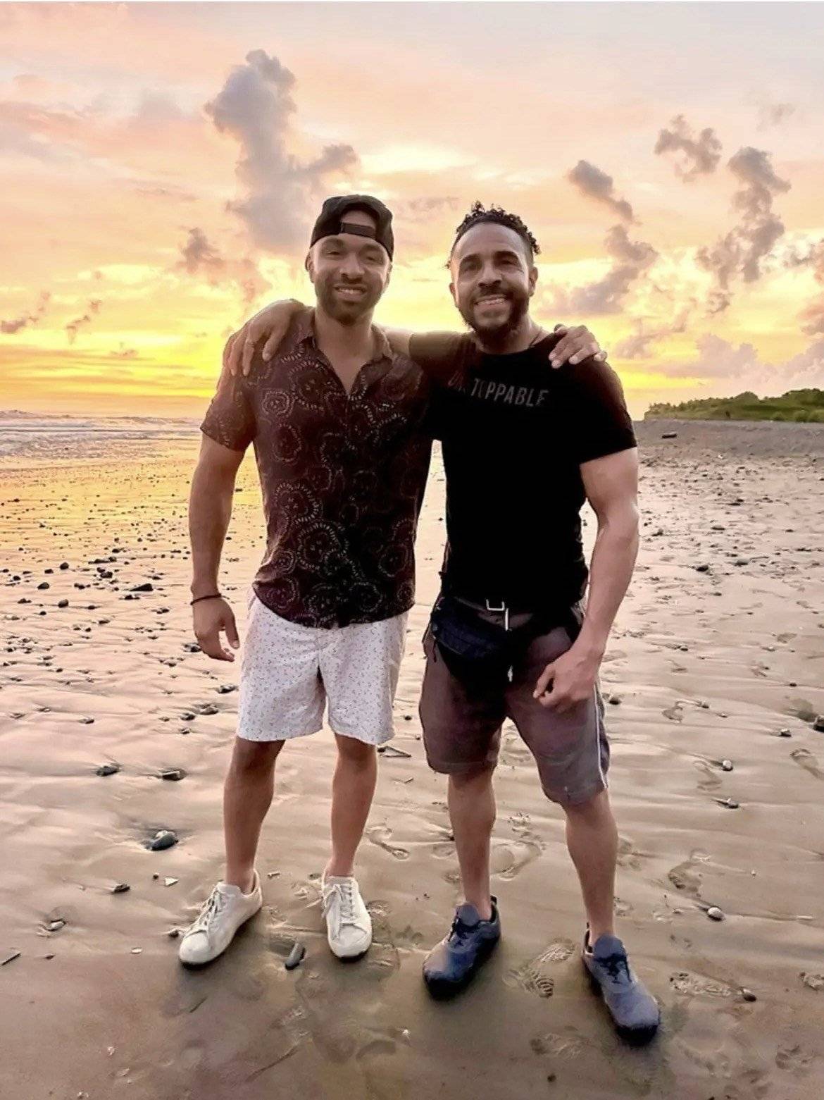 Dwight and Chris, co-founders of Ascend, on the beach in Costa Rica at sunset